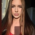 эскортница с рыжими волосами
